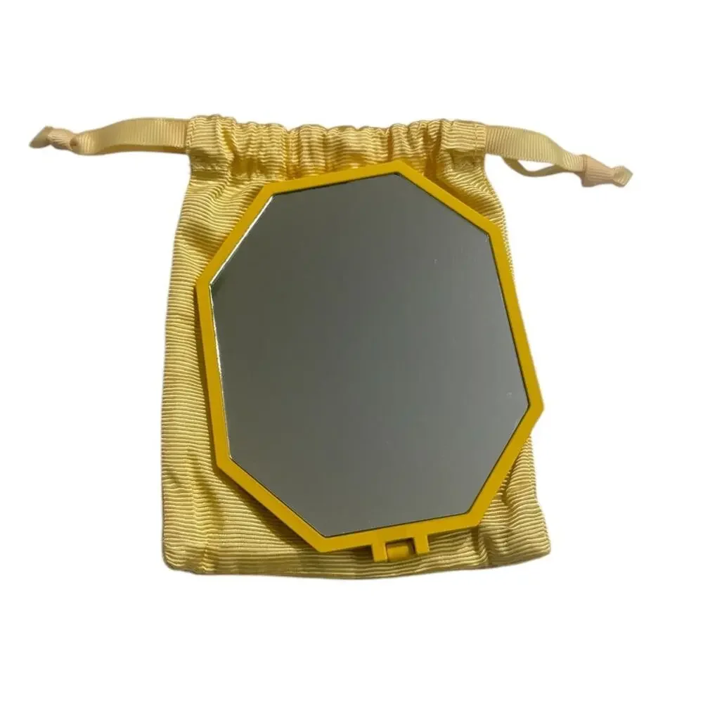 Swarovski yellow handheld mirror